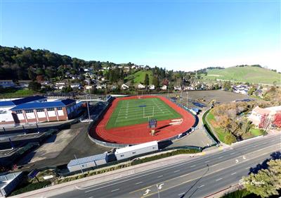 Aerial of the field house building area and football field